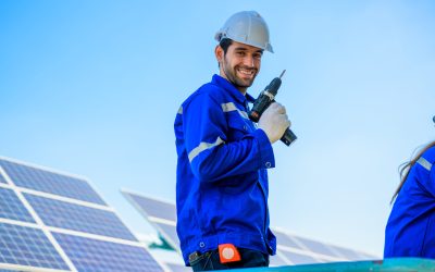 solar panel station, engineer installing solar panel at solar energy farm field